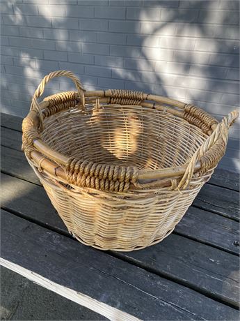 Large round wicker basket with handles